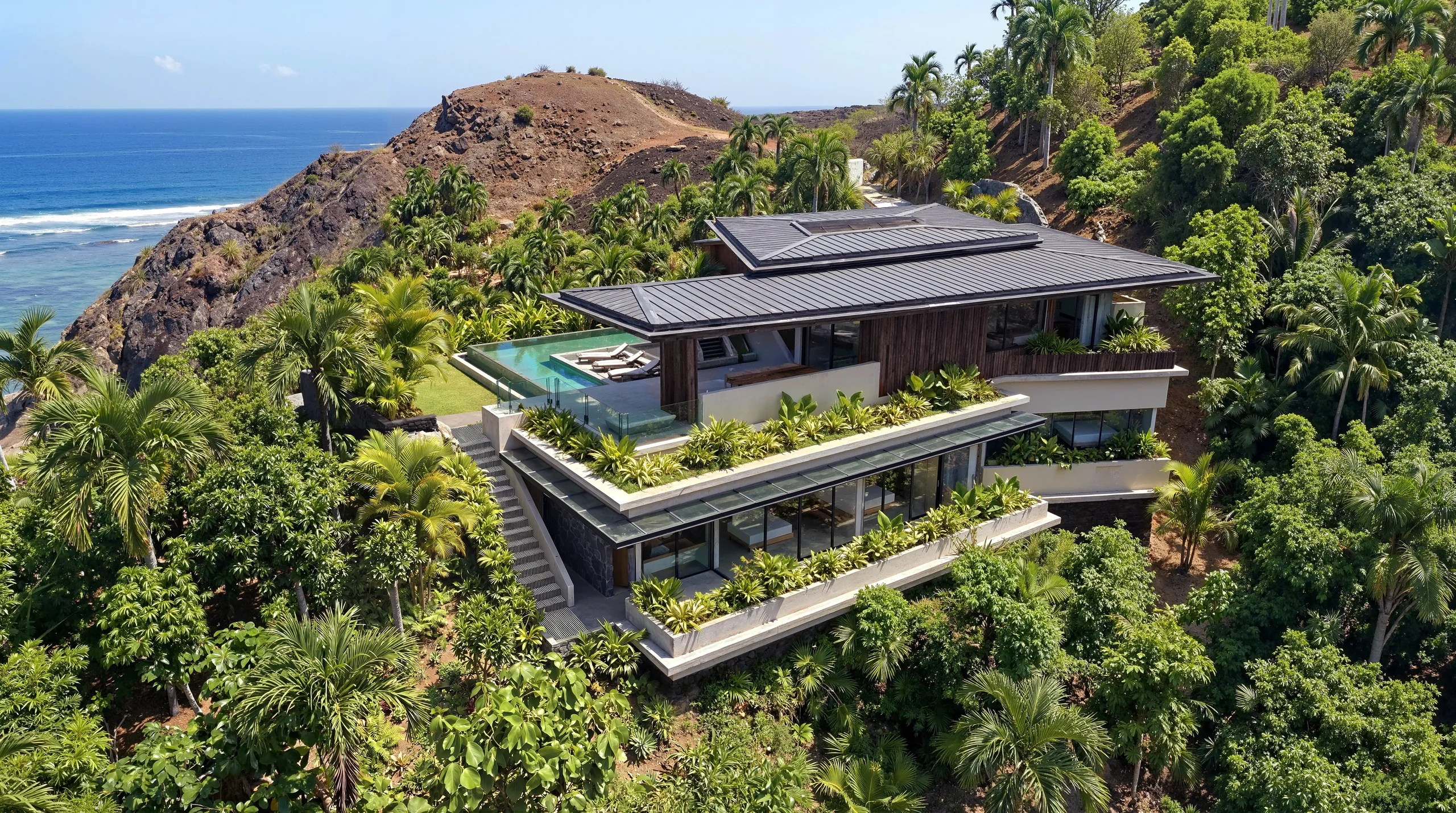Cliffside tropical residence surrounded by landscape